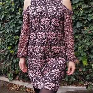 A cold shoulder lace knit dress; Mock neck